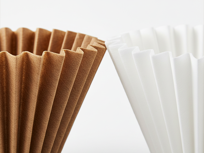 TruBrew Side-by-side comparison of a natural brown TruBrew filter and a bleached white TruBrew filter.